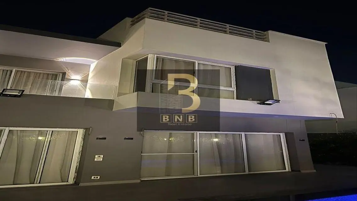 Luxurious 4-Bedroom Apartment with Private Pool and Garden