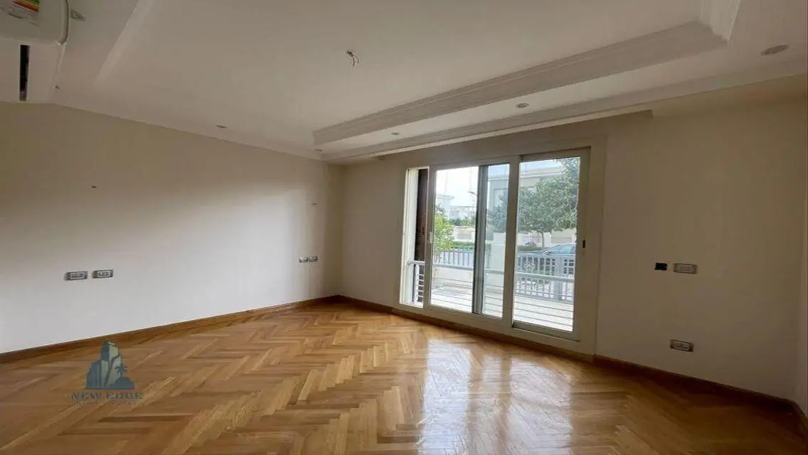 Luxurious Five-Bedroom Apartment with Private Garden and Shared Pool