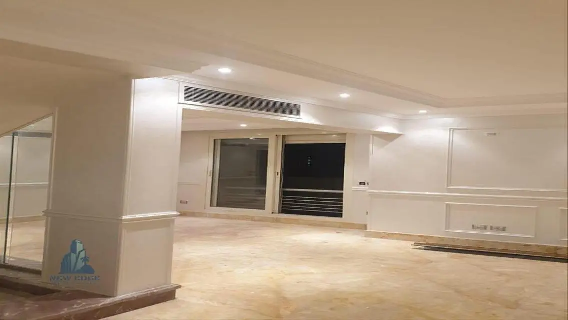 Luxurious Five-Bedroom Apartment with Private Garden and Shared Pool