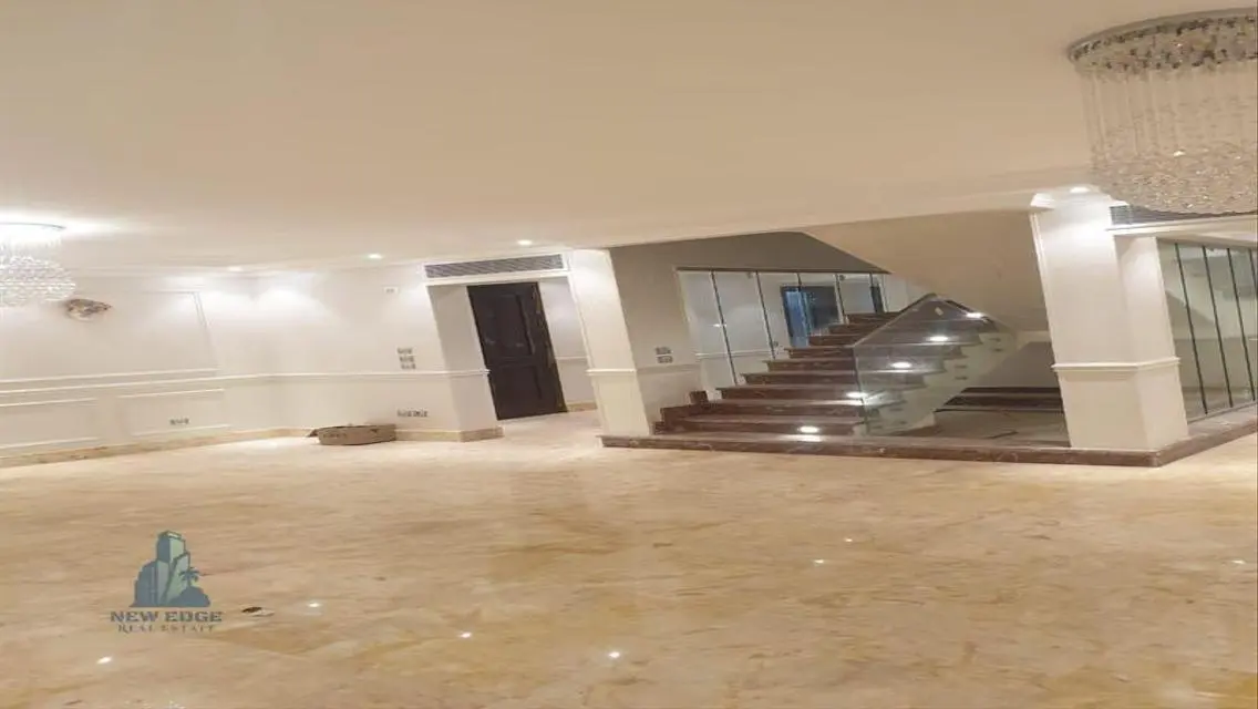 Luxurious Five-Bedroom Apartment with Private Garden and Shared Pool